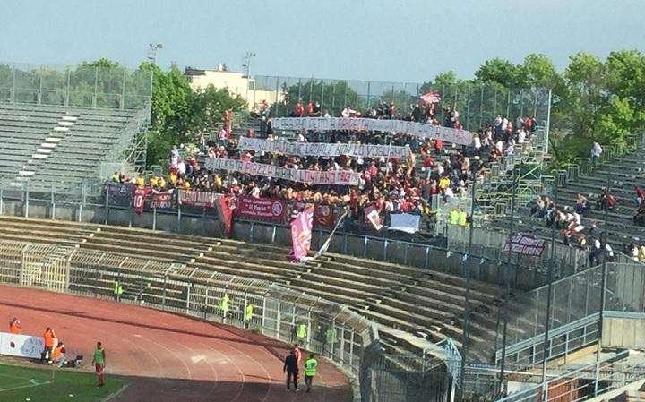 Uno striscione contro Romano a Piacenza