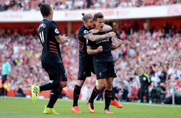 Pennellata di Coutinho: il Liverpool agguanta l'Arsenal