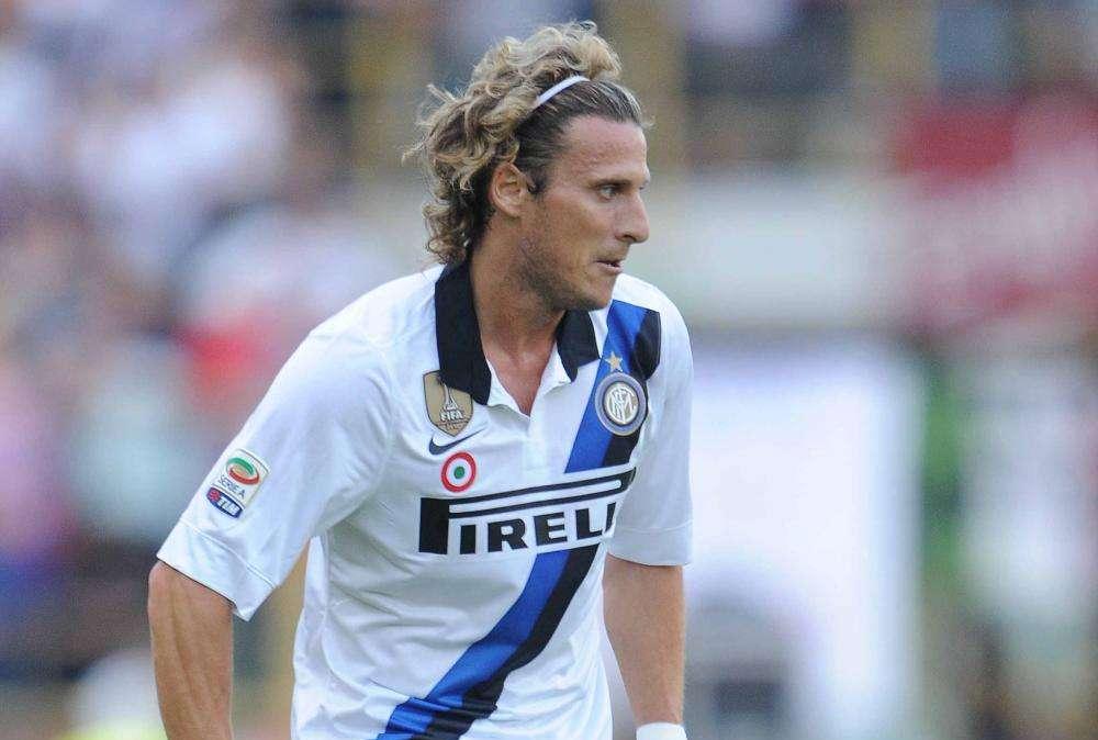Forlan in gruppo per una parte di lavoro