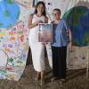 L'artista umbra Moira Lena Tassi conquista Portoferraio con la sua "Eco-Bandiera collettiva della pace più lunga del mondo"