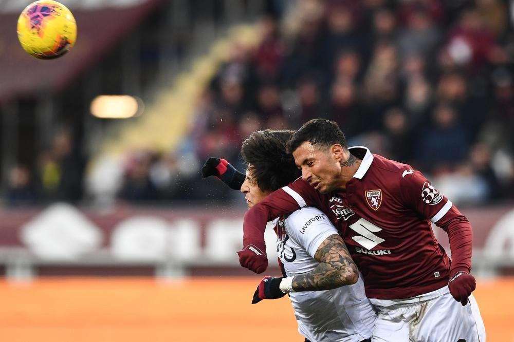 Il confronto delle pagelle di Izzo con il Bologna