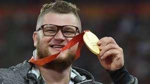  Mondiale di atletica: vince l'oro si ubriaca e paga il taxi con la medaglia.