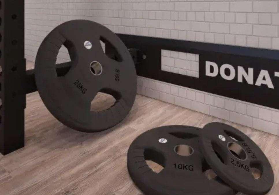 Dischi gommati con maniglie professionali: la guida completa per la tua palestra
