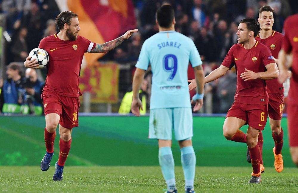 I numeri di... Roma-Barcellona 3-0 - Olimpico inviolato in Champions League. De Rossi come Totti, 20ª marcatura per Dzeko
